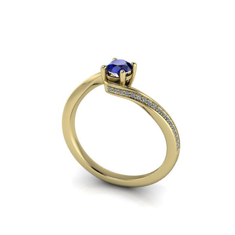 Verlobungsring aus Gelbgold mit Saphir blau und Diamant